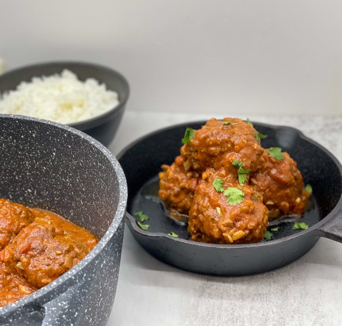 Photo of Cuban albondigas served with white rice.