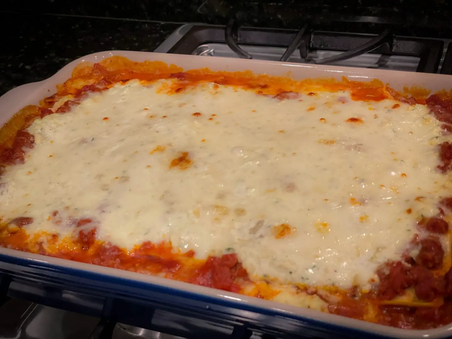 Cooked lasagne out of the oven.