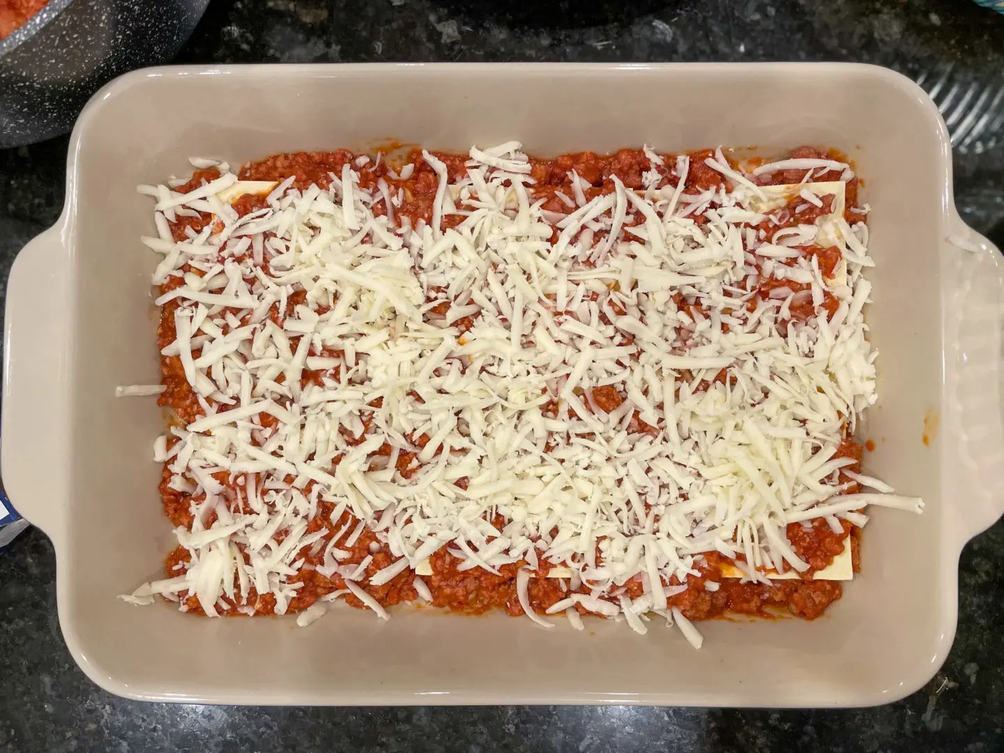 Mozzarella cheese layer for lasagne.