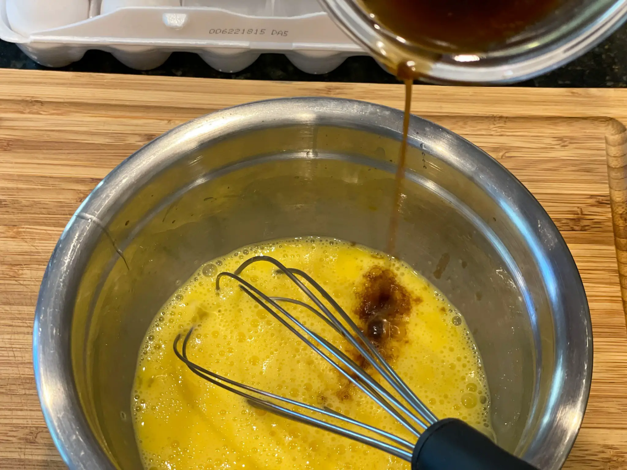 adding flavor to scrambled eggs