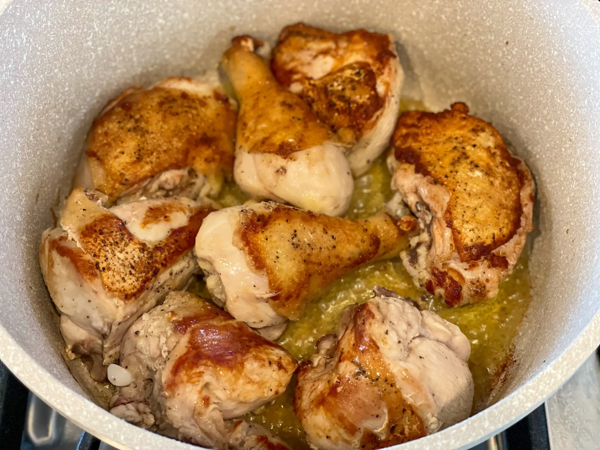 Browning chicken for arroz amarillo con pollo.