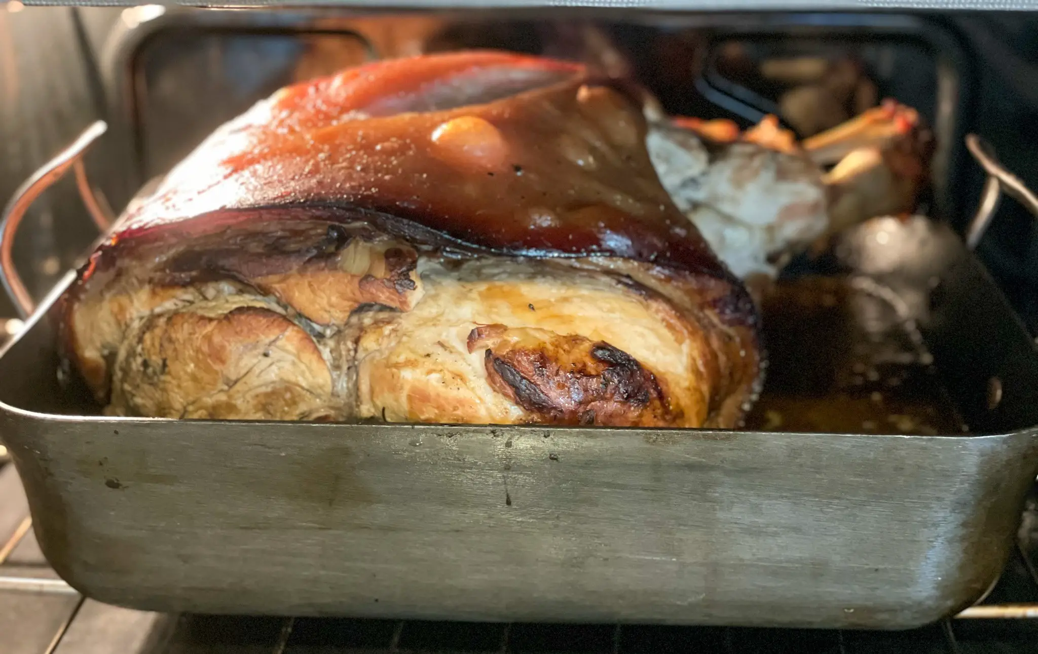 Lechon coming out of the oven.