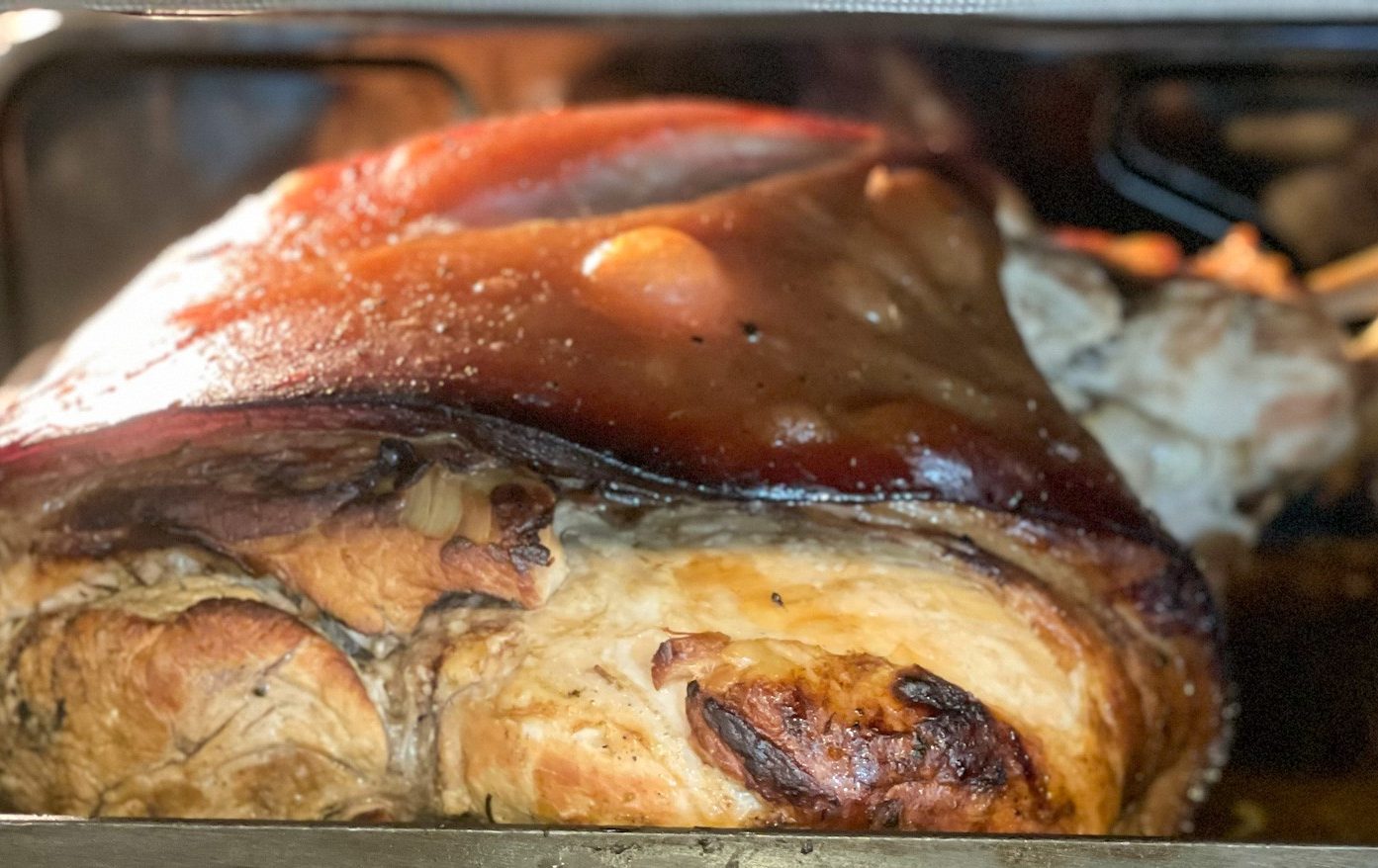 Lechon coming out of the oven.