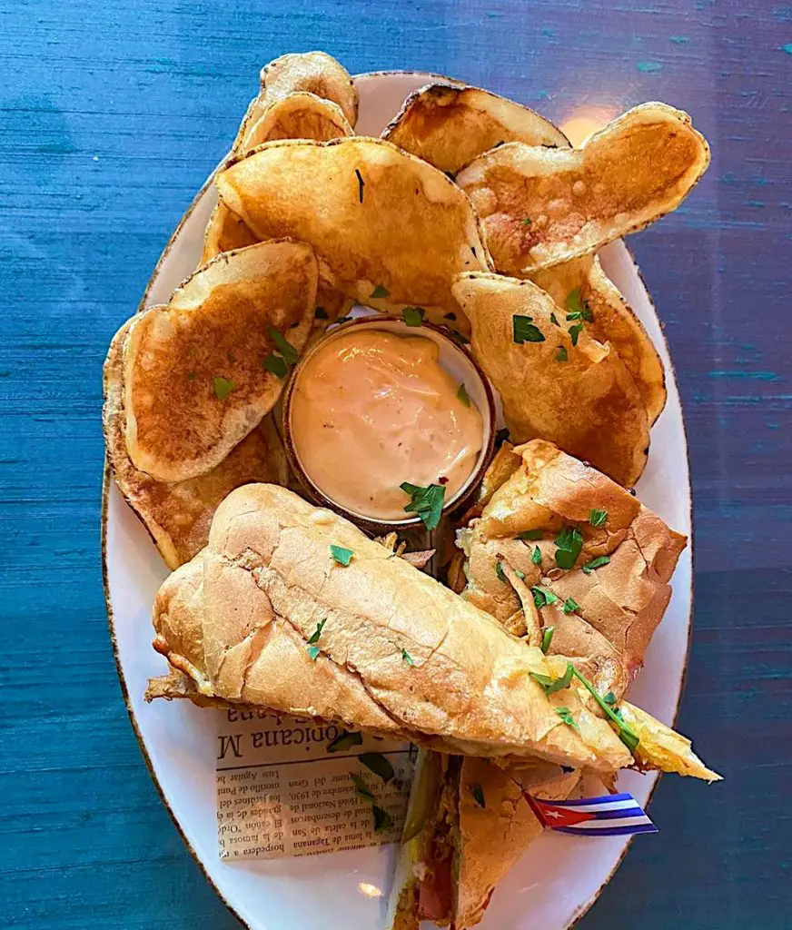 A Cuban sandwich and potato chips from Cubano’s restaurant.