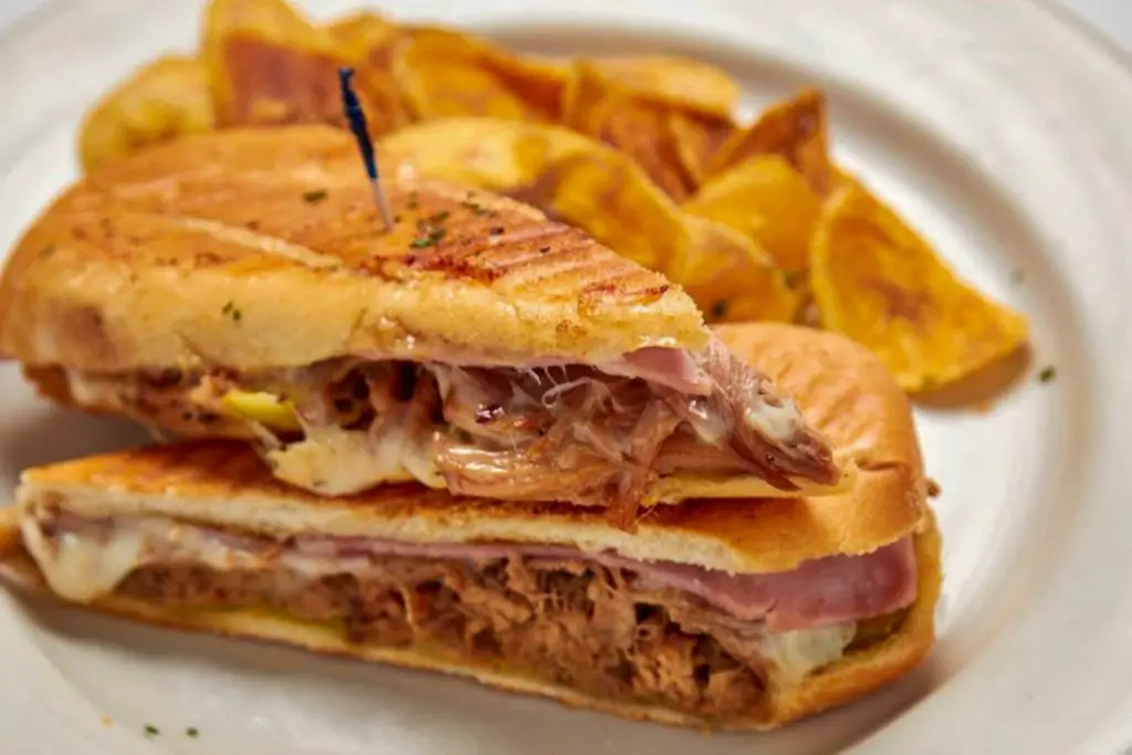 A stacked Cuban sandwich and plantain chips from Guantanamera restaurant.
