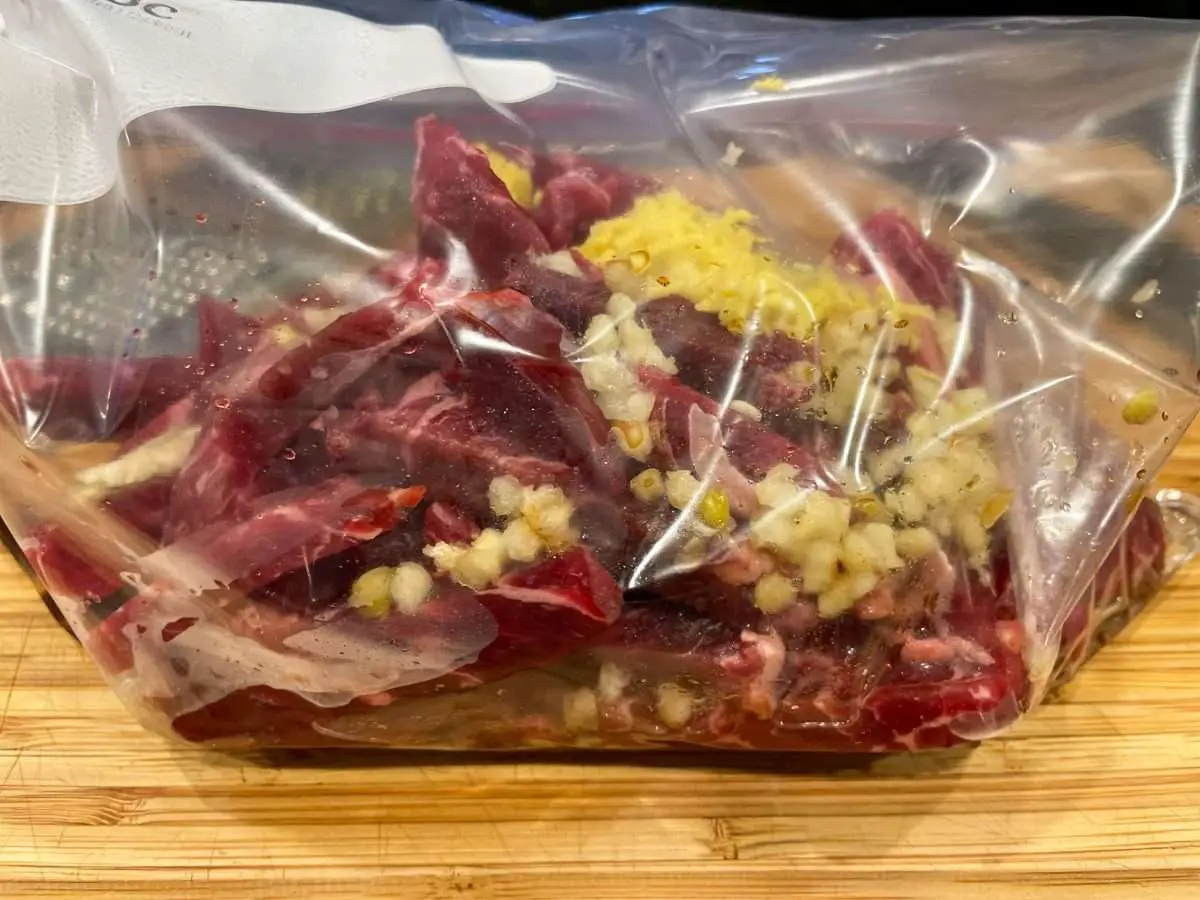 Put steak strips and marinade ingredients in a ziplock bag.