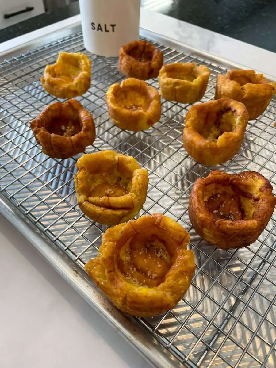 Plantain cups on a wire rack.