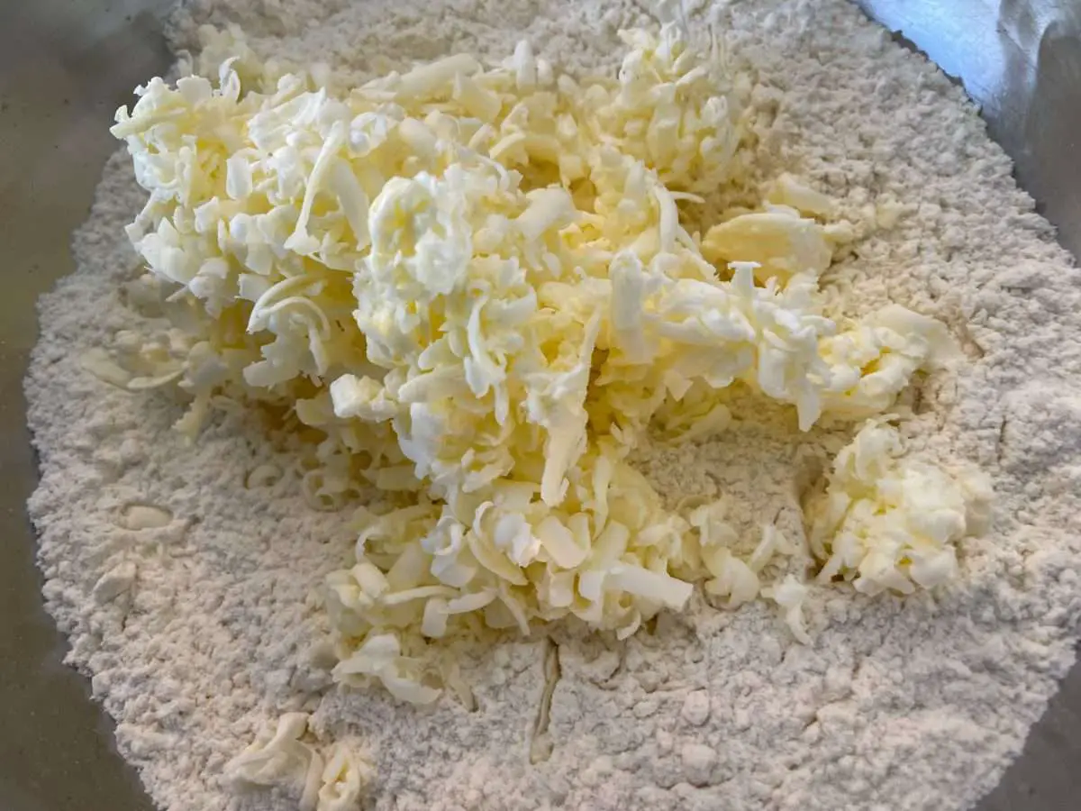 Mix in frozen butter to dry ingredients.