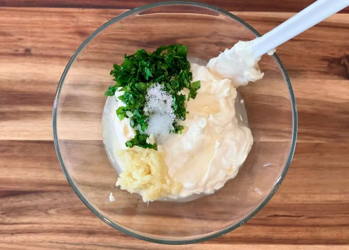 Cilantro, garlic and lime juice with mayonnaise to make cilantro aioli.