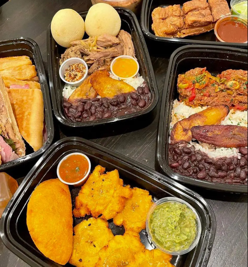 Many different menu items in to go containers from Chao Pescao restaurant.