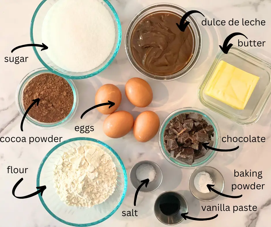 The ingredients to make dulce de leche brownies in separate bowls.