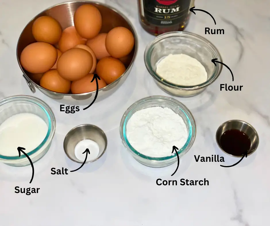 Panetela borracha (drunken rum cake) ingredients. The ingredients include eggs, flour, sugar, salt, corn starch and vanilla.